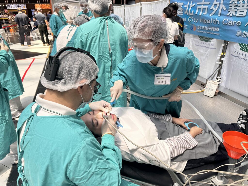 Six dental chairs are set up on-site, where professional dentists and assistants provide dental check-ups for migrant workers.